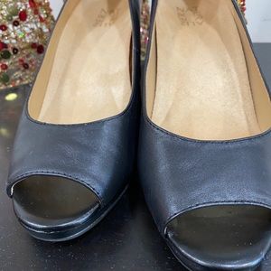 Black leather peep-toe wedges